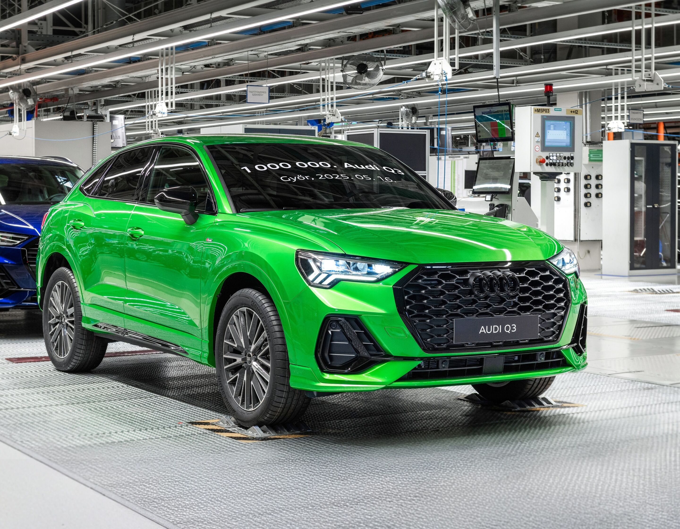 One millionth Audi Q3 made in Győr - An Audi Q3 in Kyalami green rolls off the production line at the Győr plant. This particular vehicle is the anniversary car, with the words “1,000,000th Audi Q3, Győr, 2025.05.16” emblazoned on the windshield.