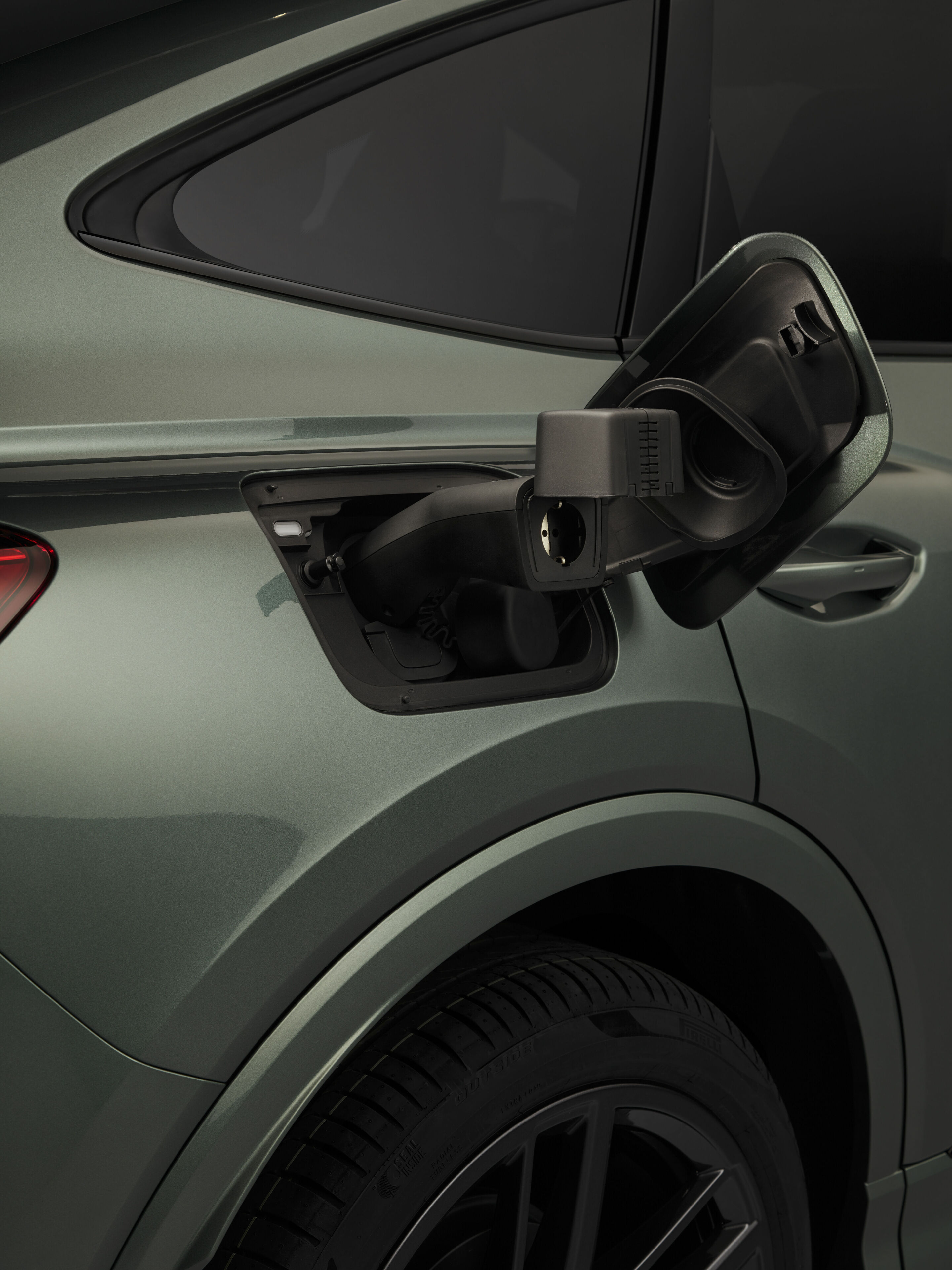Audi Q4 Sportback e-tron - Sage green metallic, studio static photo, exterior, charging port